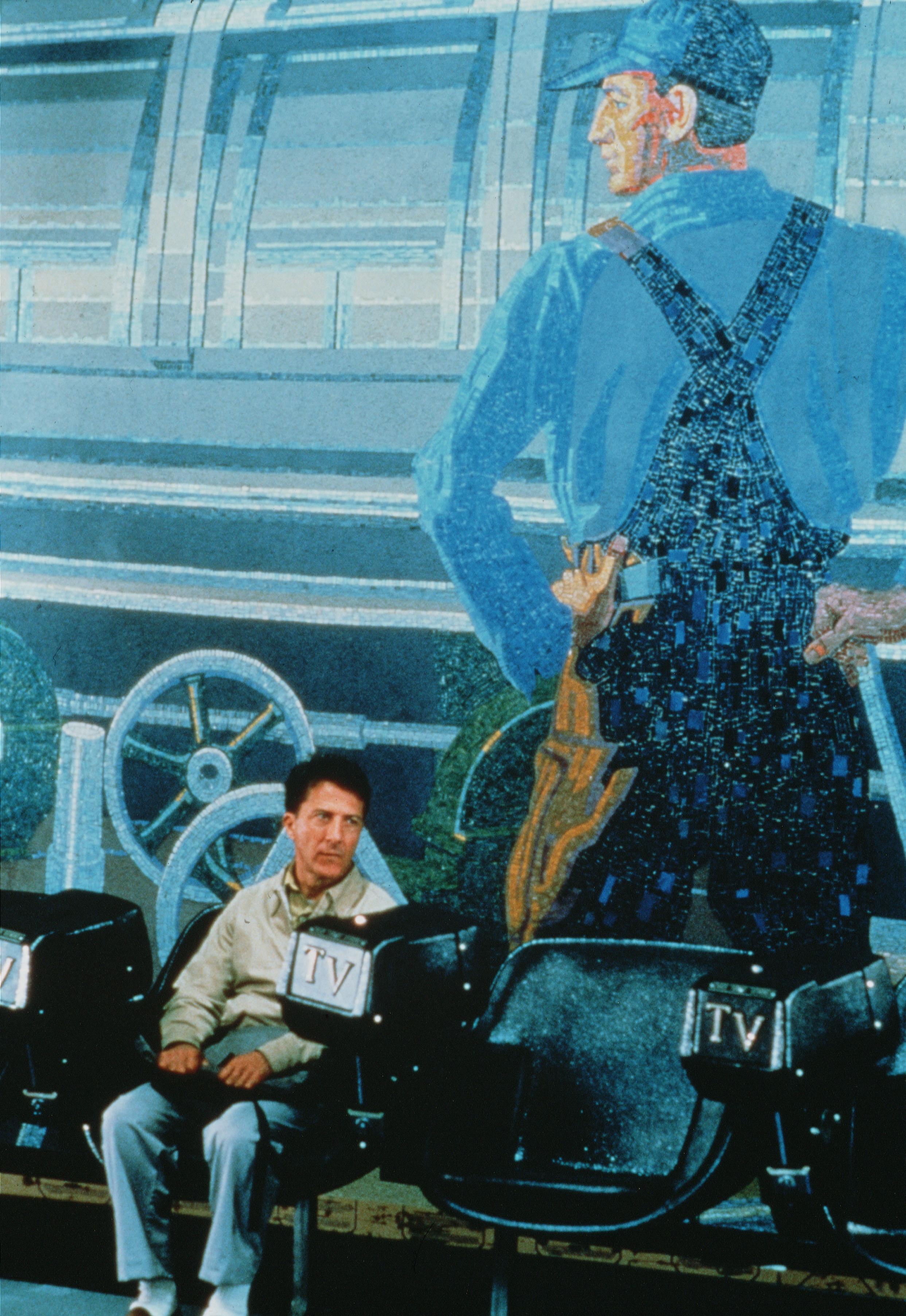 Dustin Hoffman v úlohe autistu vo filme Rain Man z roku 1988.
