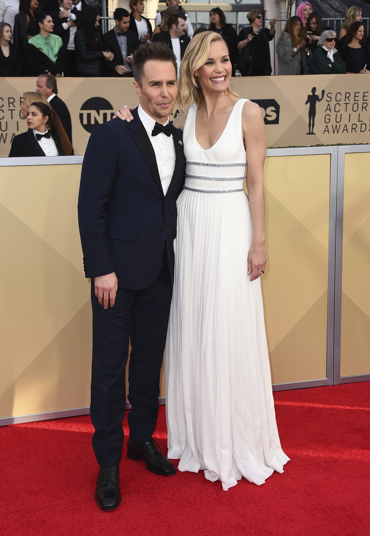 Herec Sam Rockwell a jeho manželka Leslie Bibb (v kreácii Prada).
