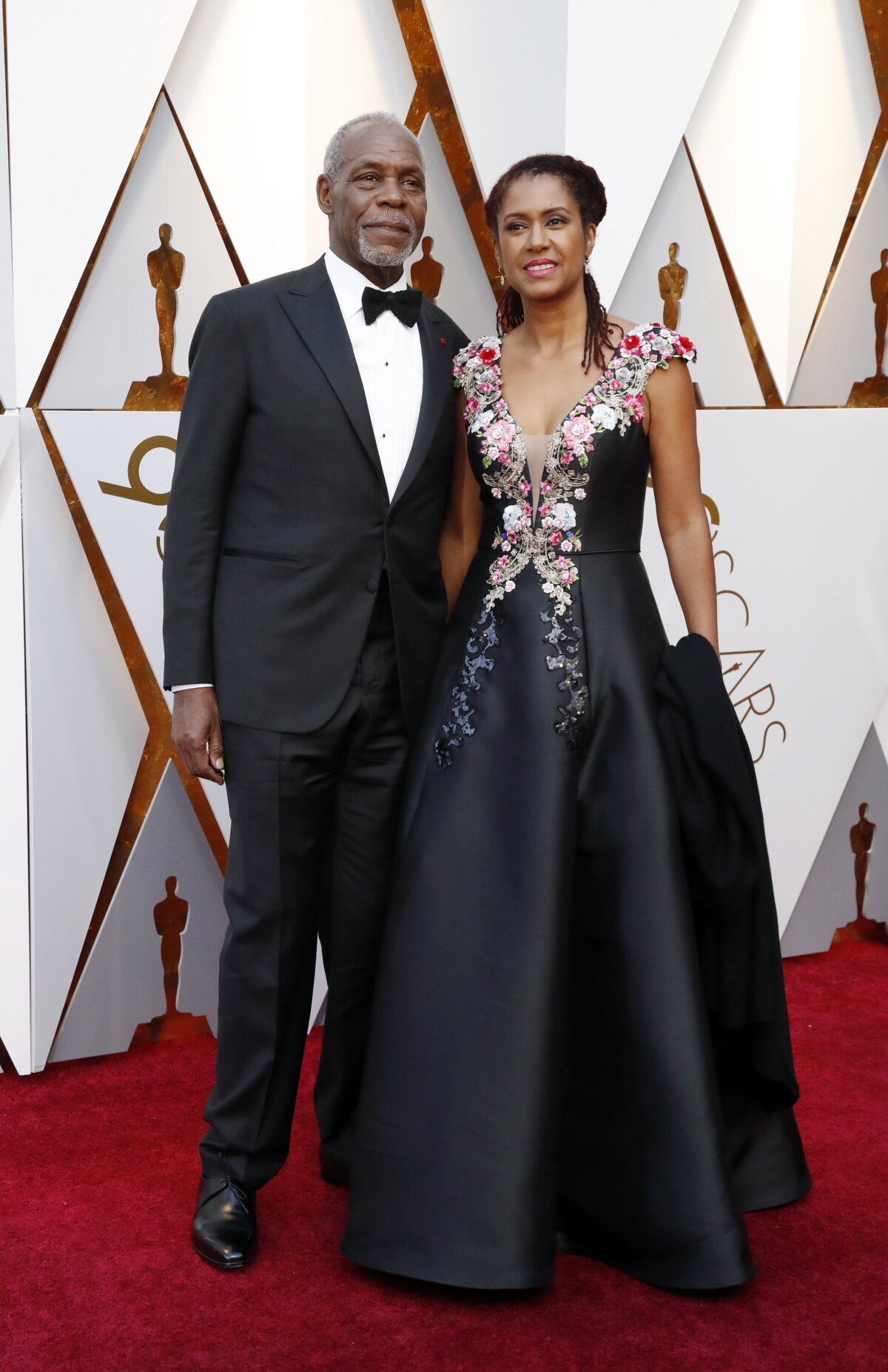 Herec Danny Glover a jeho partnerka Eliane Cavalleiro.