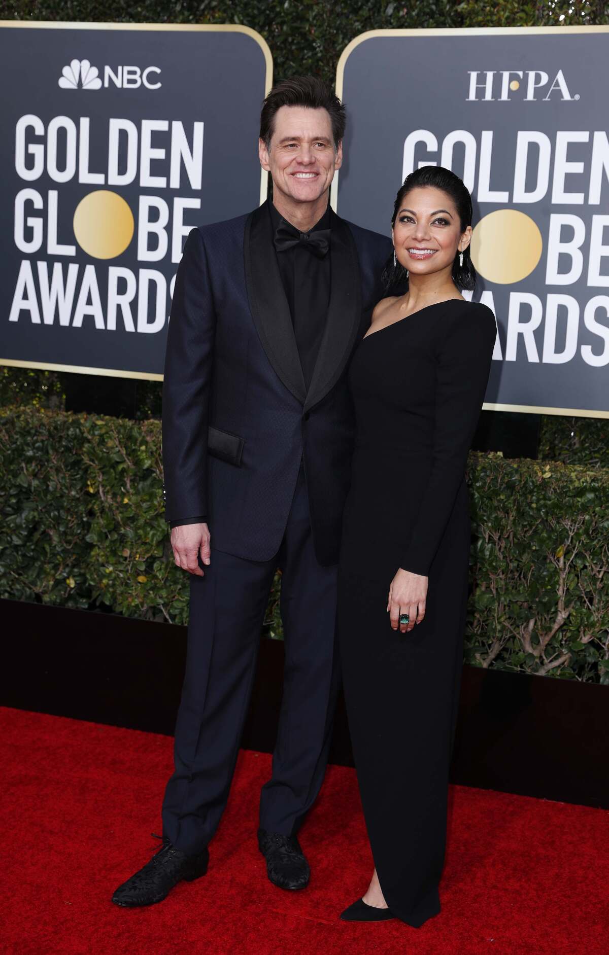 Herec Jim Carrey a jeho partnerka Ginger Gonzaga.