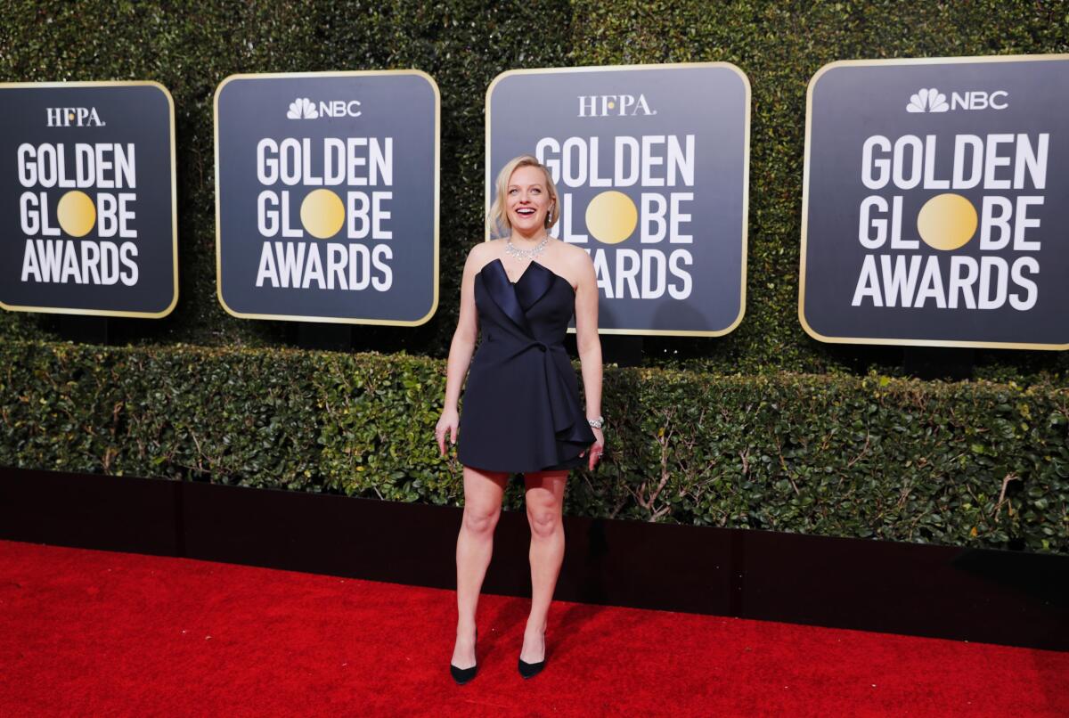 Herečka Elizabeth Moss v kreácii Dior Haute Couture.