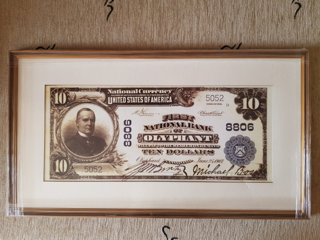 Bankovka podpísaná Michalom Bosákom a P. J. McGintym.