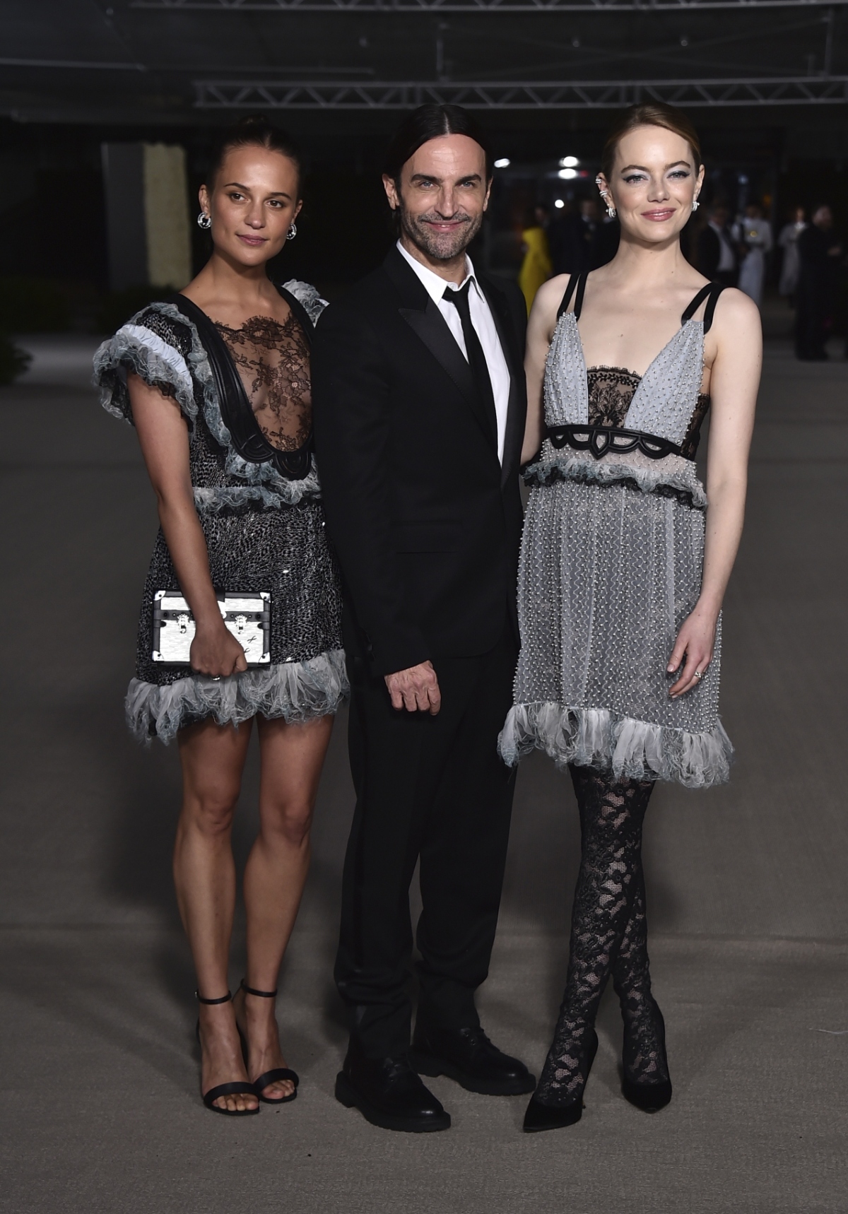 Alicia Vikander, dizajnér Nicolas Ghesquiere a herečka Emma Stone