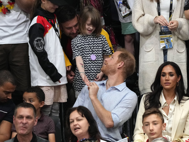 Princ Harry a jeho manželka Meghan Markle