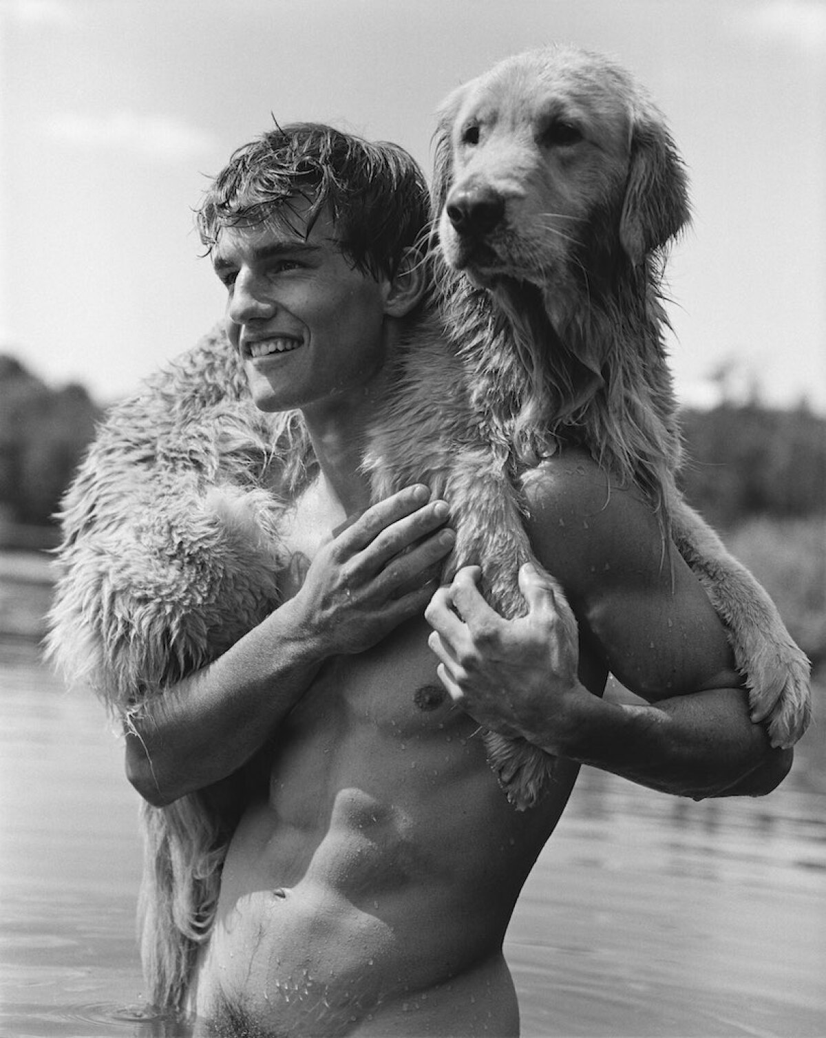 Bruce Weber: Rob and Little Bear, Bear Pond, Adirondack Park, NY, 1990