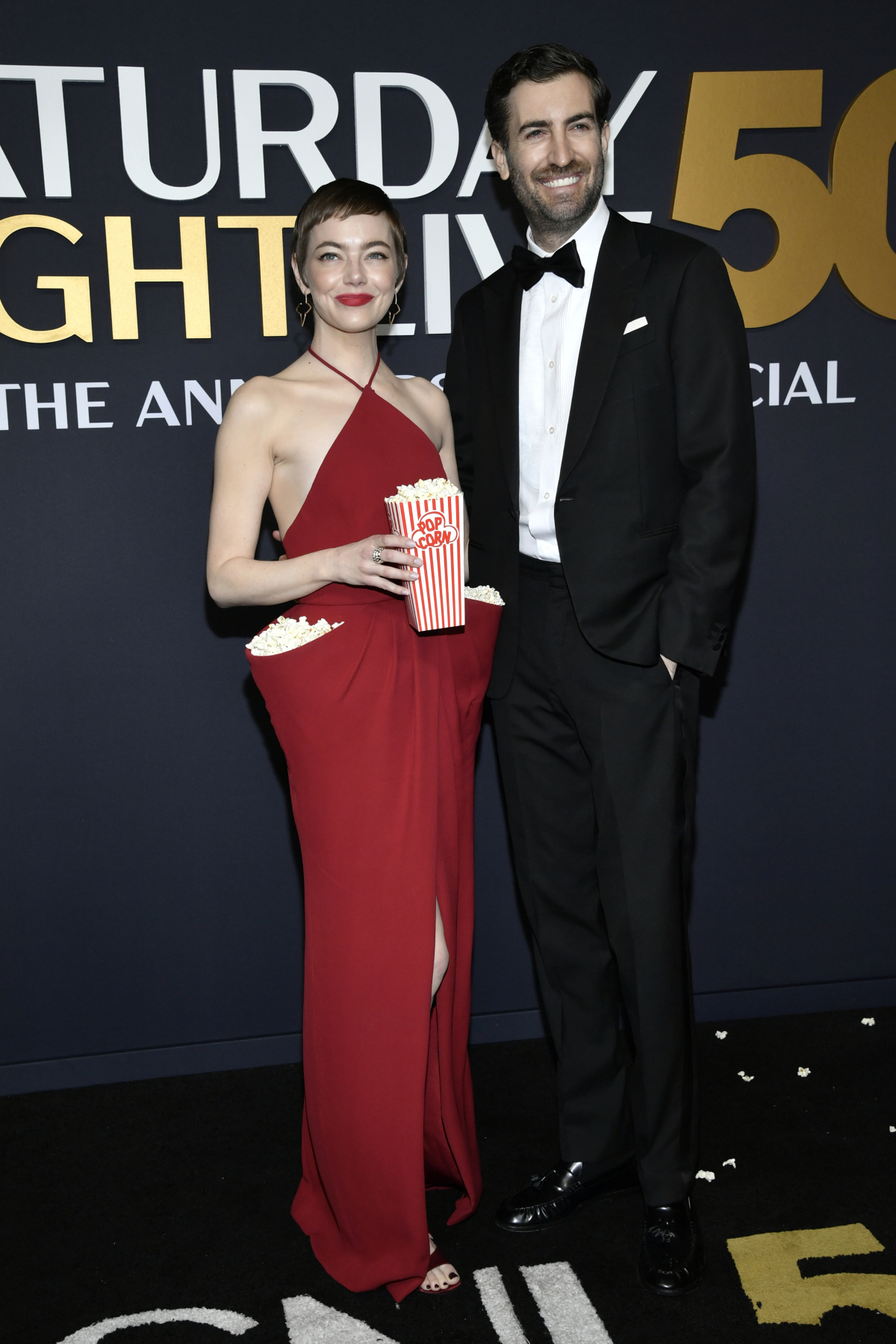 Emma Stone v kreácii Louis Vuitton a jej manžel Dave McCary
