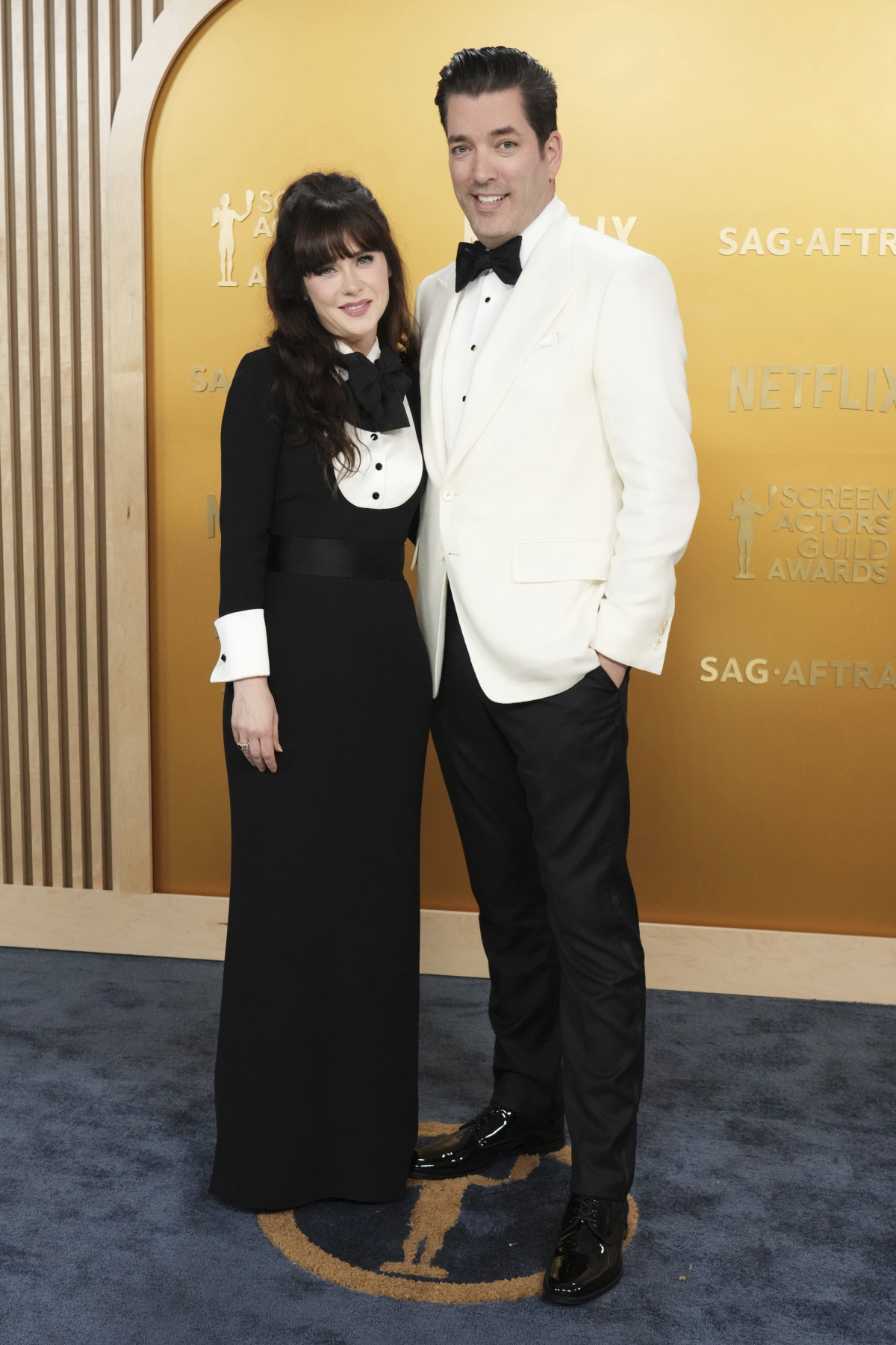 Herečka Zooey Deschanel a jej manžel Jonathan Scott.