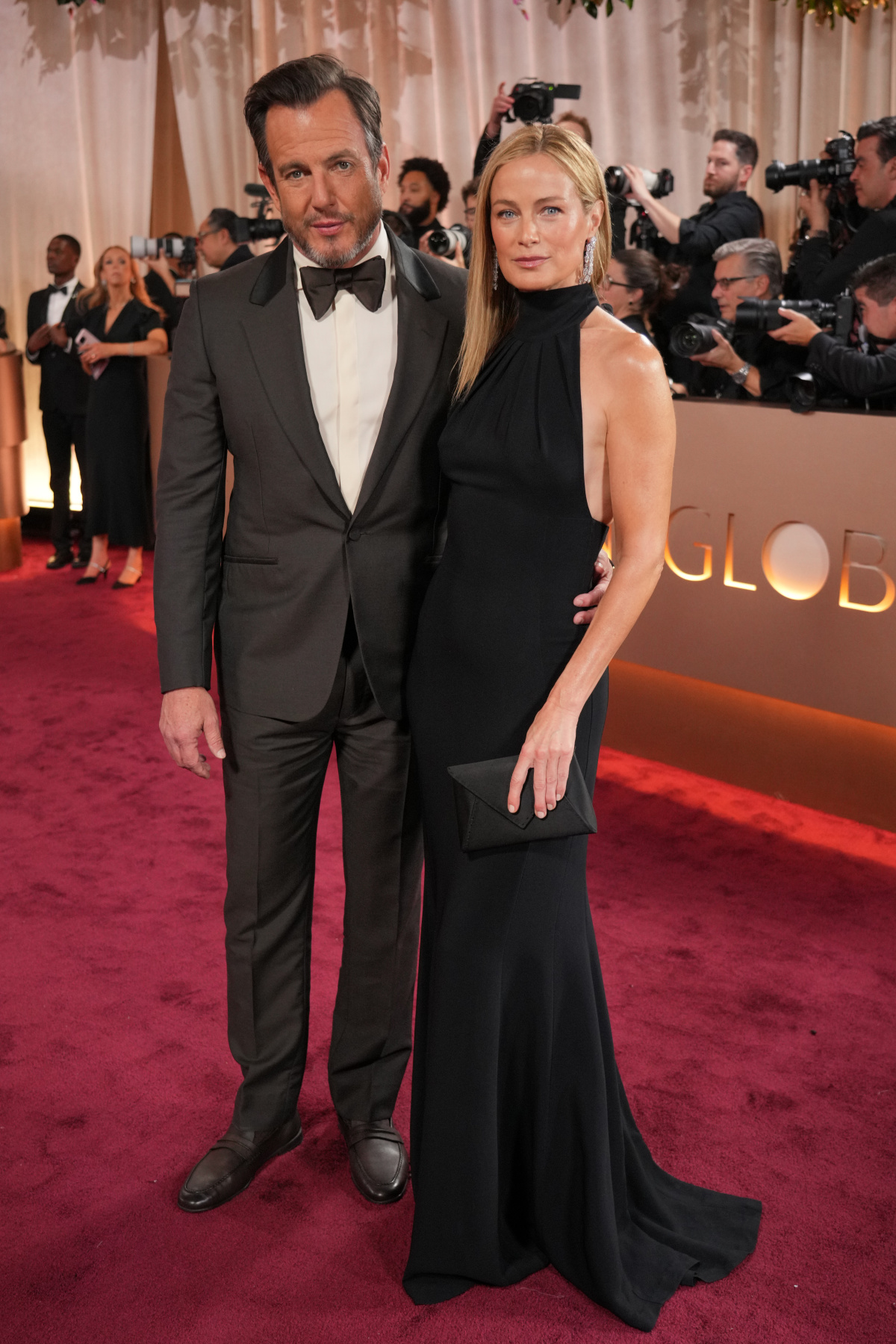 Herec Will Arnett a jeho partnerka - modelka Carolyn Murphy.
