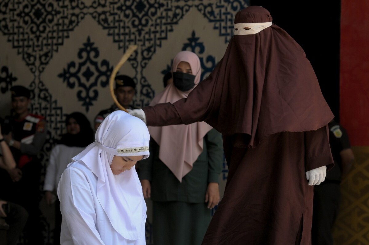 Banda Aceh, Katka, kat, trest, bičovanie, šaría, Indonézia